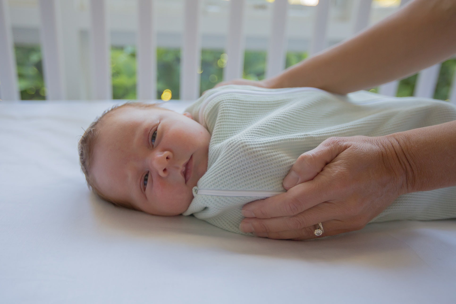 Preparing a cot for baby